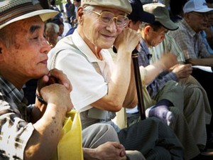 Older persons sitting in an event