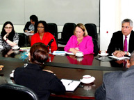 Commissioners Dinah Shelton and Tracy Robinson in a meeting with Winston Lackin, Minister of Foreign Affairs of Suriname.