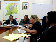 Commissioners Dinah Shelton and Tracy Robinson in a meeting with Soewarto Moestadja, Minister of Home Affairs of Suriname.