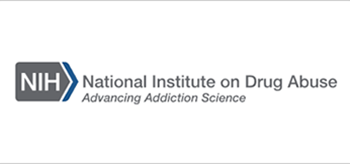 NIDA Logo - “NIH” spelled on gray and blue arrow, with name of the institute following it.