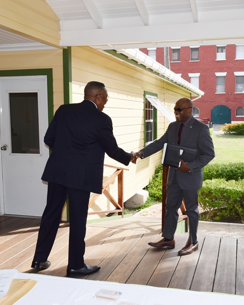 OAS Country Representative Francis McBarnette, greets Hon. Edmund Hinkson, Minister of Home Affairs ahead of the opening of the Barbados National workshop on gender equality in counter-drug enforcement agencies  GENLEA/OAS CICAD, at the Barbados Defence Force, St. Ann's Fort the Garrison(December 11, 2018)