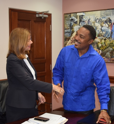 OAS delegation pays a courtesy call on the Minister of  Youth and Community Empowerment , Hon. Adrian Forde , as he greets, Angela Crowdy, Assistant Executive Secretary of OAS CICAD, Isabella Araujo. Program Officer OAS CICAD and OAS Country Representative Francis McBarnette, on May 22, 2019.(May 22, 2019)
