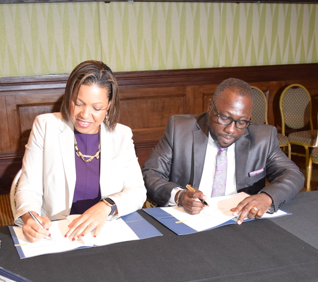 Hon. Dwight Sutherland, Minister of Small Business, Enterprise and Commerce and Kim Osborne, Executive Secretary for Integral Development of the OAS, signed the Memorandum of Understanding  (MOU) between the three agencies at the event, Sept 18, 2019(September 18, 2019)