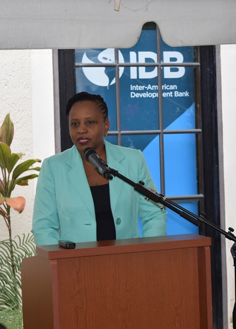 MC Erika Watson OAS Admin Officer, at the opening of the OAS 70th Anniversary Celebration 2018, at the IADB Barbados Office, October 5th 2018.The Head table  from left to right, Juan Carlos De La Hoz Vinas, IADB Country Representative to Barbados, Senator Dr. the Hon. Jerome Walcott, Minister of Foreign Affairs and Foreign Trade and OAS Representative in Barbados, Francis McBarnette.(October 5, 2018)